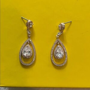 Kendra Scott Elegant Gold and Silver Teardrop Earrings